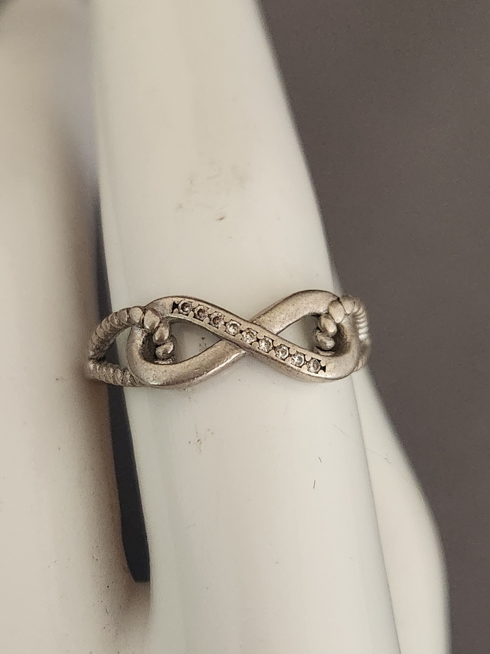 Sterling Silver Infinity Twist Ring with Cubic Zirconia